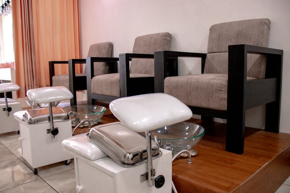 Cozy pedicure chairs and foot baths in a modern salon setting
